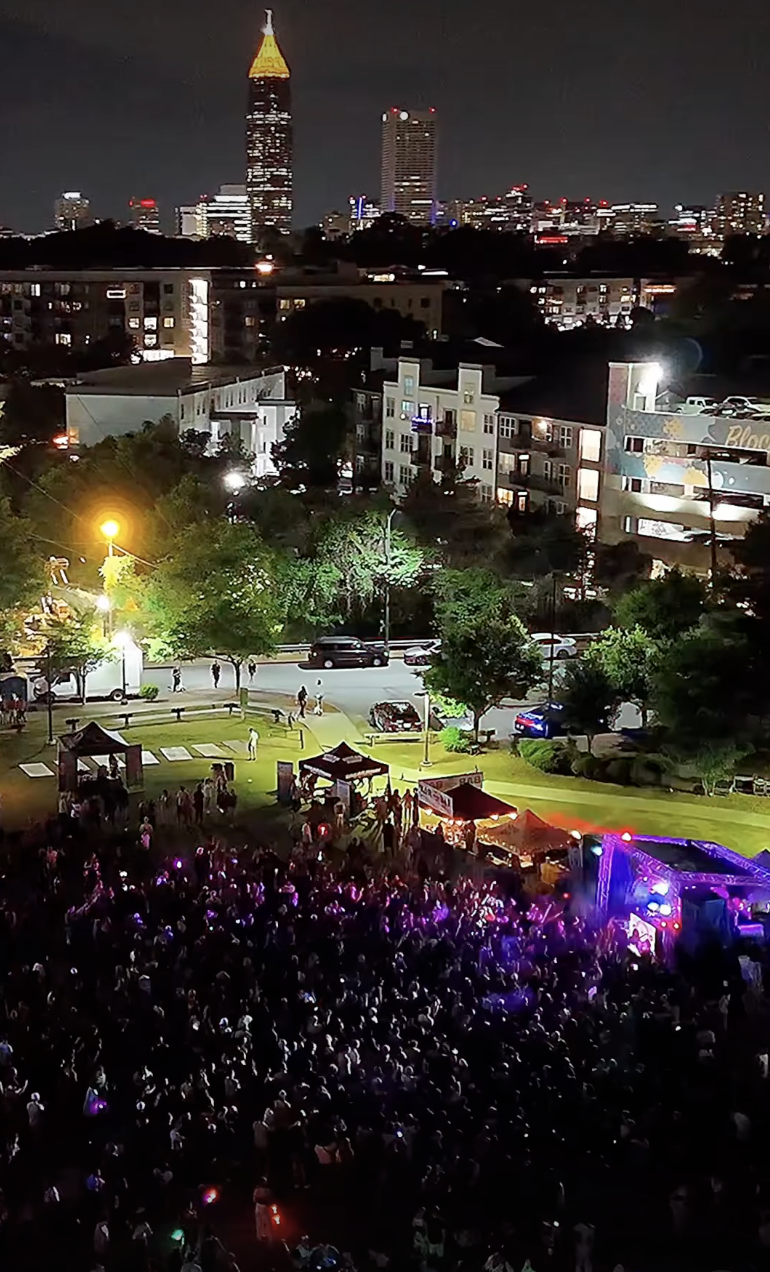 Beats on the Block Atlanta festival crowd and skyline at night